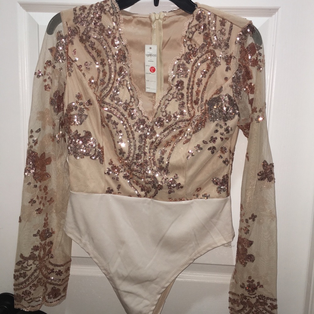New with tags body suit